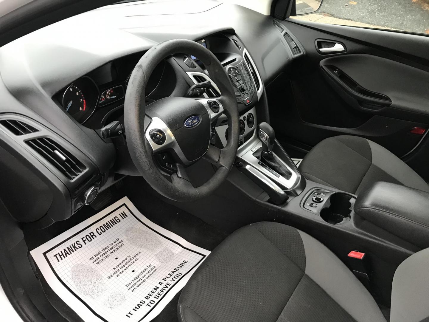 2013 White /Black Ford Focus SE Sedan (1FADP3F20DL) with an 2.0L L4 DOHC 16V engine, Automatic transmission, located at 577 Chester Pike, Prospect Park, PA, 19076, (610) 237-1015, 39.886154, -75.302338 - 2013 Ford Focus SE: Only 95k miles, sunroof, great on gas, new PA inspection, runs LIKE NEW! This vehicle comes inspected and has been given a bumper to bumper safety check. It is very clean, reliable, and well maintained. We offer a unique pay plan that is known for being the easiest and fastest - Photo#11