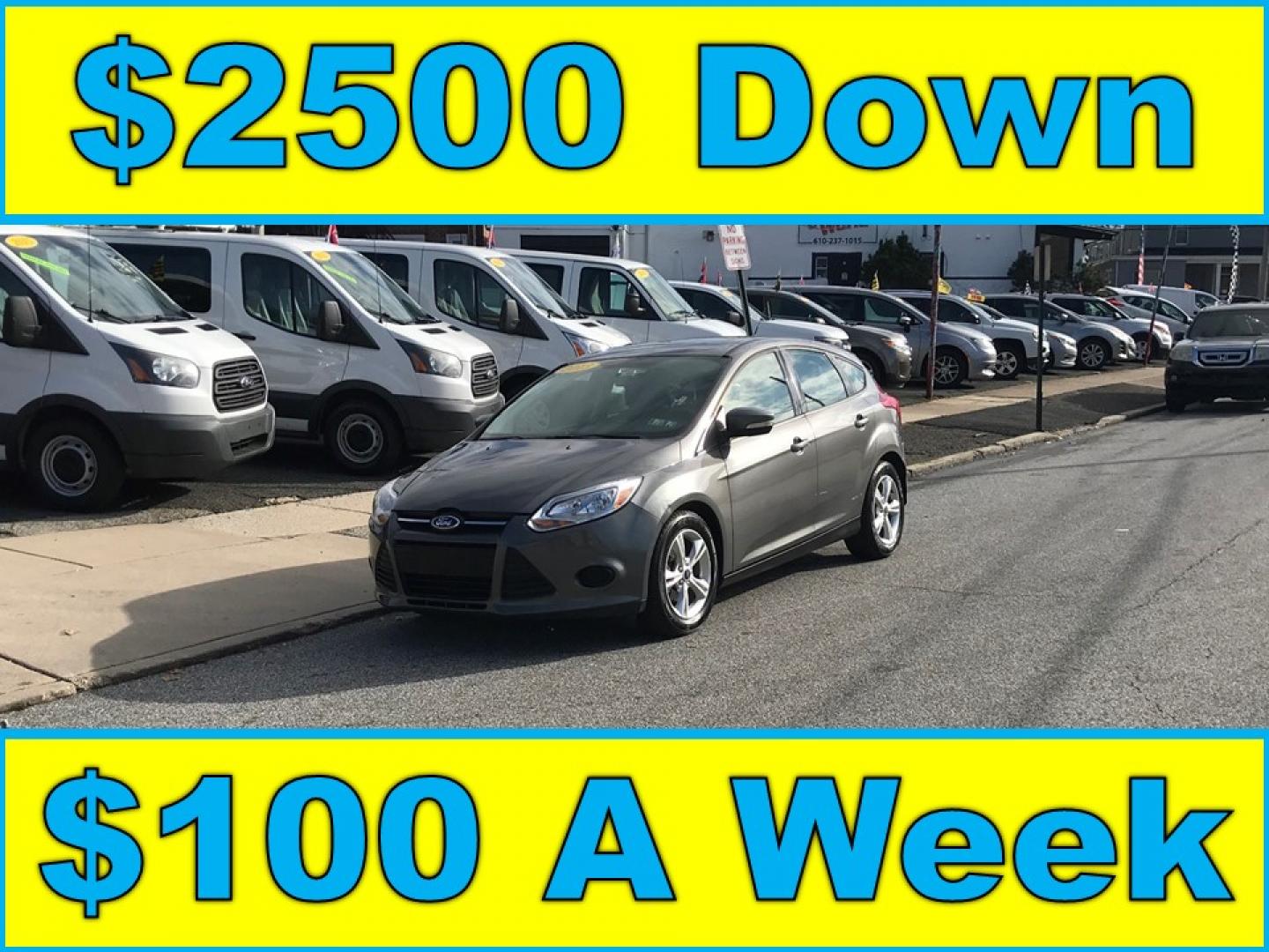 2013 Gray /Gray Ford Focus SE Hatch (1FADP3K28DL) with an 2.0L L4 DOHC 16V engine, Automatic transmission, located at 577 Chester Pike, Prospect Park, PA, 19076, (610) 237-1015, 39.886154, -75.302338 - Photo#0