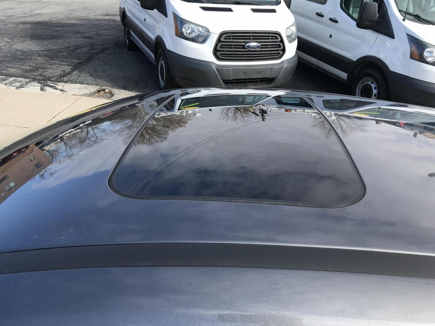 2013 Gray /Gray Ford Focus SE Hatch (1FADP3K28DL) with an 2.0L L4 DOHC 16V engine, Automatic transmission, located at 577 Chester Pike, Prospect Park, PA, 19076, (610) 237-1015, 39.886154, -75.302338 - Photo#6