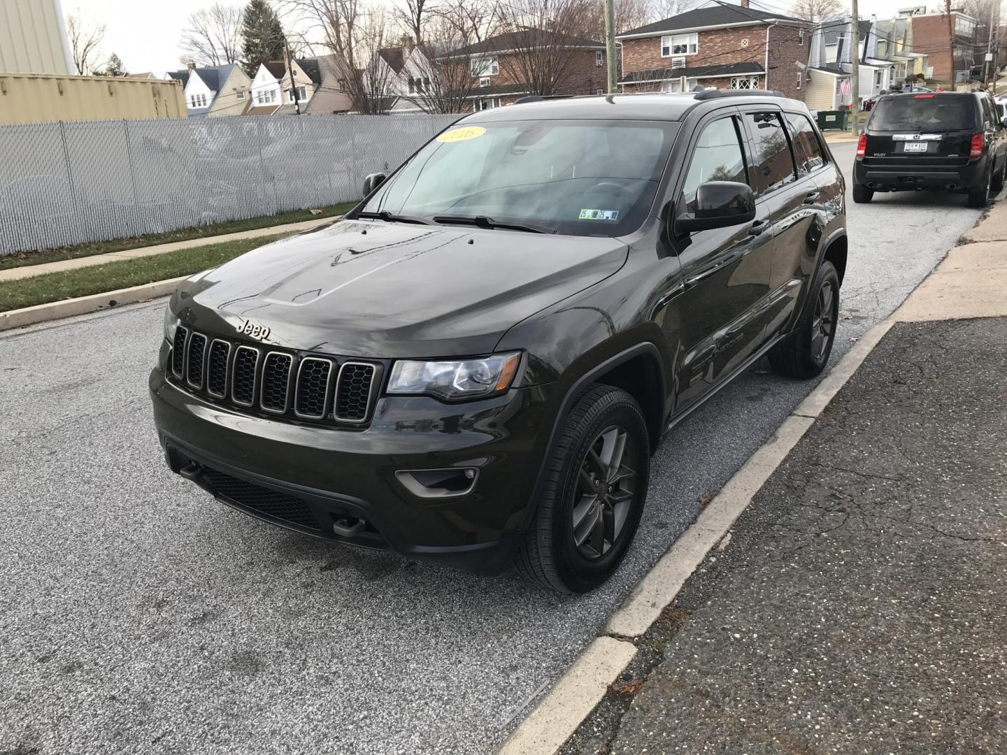 2016 Green /Black Jeep Grand Cherokee Laredo 4WD (1C4RJFAG0GC) with an 3.6L V6 DOHC 24V engine, 8A transmission, located at 577 Chester Pike, Prospect Park, PA, 19076, (610) 237-1015, 39.886154, -75.302338 - Photo#2