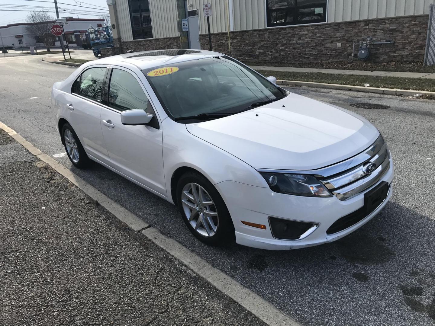 2011 White /Tan Ford Fusion I4 SEL (3FAHP0JA8BR) with an 2.5L L4 DOHC 16V engine, Automatic transmission, located at 577 Chester Pike, Prospect Park, PA, 19076, (610) 237-1015, 39.886154, -75.302338 - 2011 Ford Fusion SEL: Only 116k miles, sunroof, new PA inspection, SUPER CLEAN, runs LIKE NEW! This vehicle comes inspected and has been given a bumper to bumper safety check. It is very clean, reliable, and well maintained. We offer a unique pay plan that is known for being the easiest and faste - Photo#2