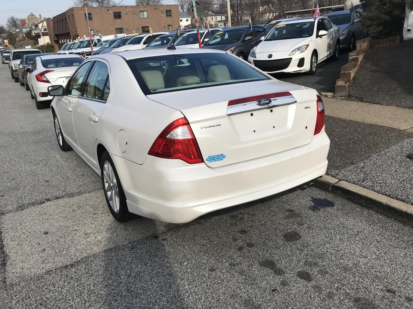 2011 White /Tan Ford Fusion I4 SEL (3FAHP0JA8BR) with an 2.5L L4 DOHC 16V engine, Automatic transmission, located at 577 Chester Pike, Prospect Park, PA, 19076, (610) 237-1015, 39.886154, -75.302338 - 2011 Ford Fusion SEL: Only 116k miles, sunroof, new PA inspection, SUPER CLEAN, runs LIKE NEW! This vehicle comes inspected and has been given a bumper to bumper safety check. It is very clean, reliable, and well maintained. We offer a unique pay plan that is known for being the easiest and faste - Photo#5