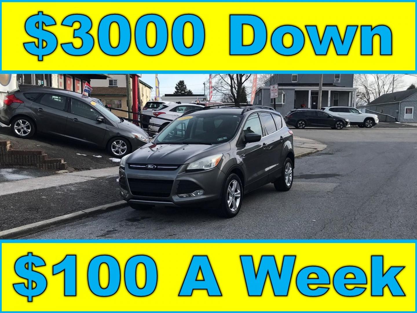 2013 Gray /Gray Ford Escape SE (1FMCU0GX3DU) with an 1.6L L4 DOHC 16V engine, 6-Speed Automatic transmission, located at 577 Chester Pike, Prospect Park, PA, 19076, (610) 237-1015, 39.886154, -75.302338 - Photo#0