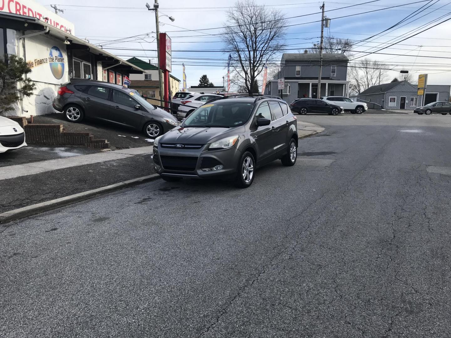 2013 Gray /Gray Ford Escape SE (1FMCU0GX3DU) with an 1.6L L4 DOHC 16V engine, 6-Speed Automatic transmission, located at 577 Chester Pike, Prospect Park, PA, 19076, (610) 237-1015, 39.886154, -75.302338 - Photo#3