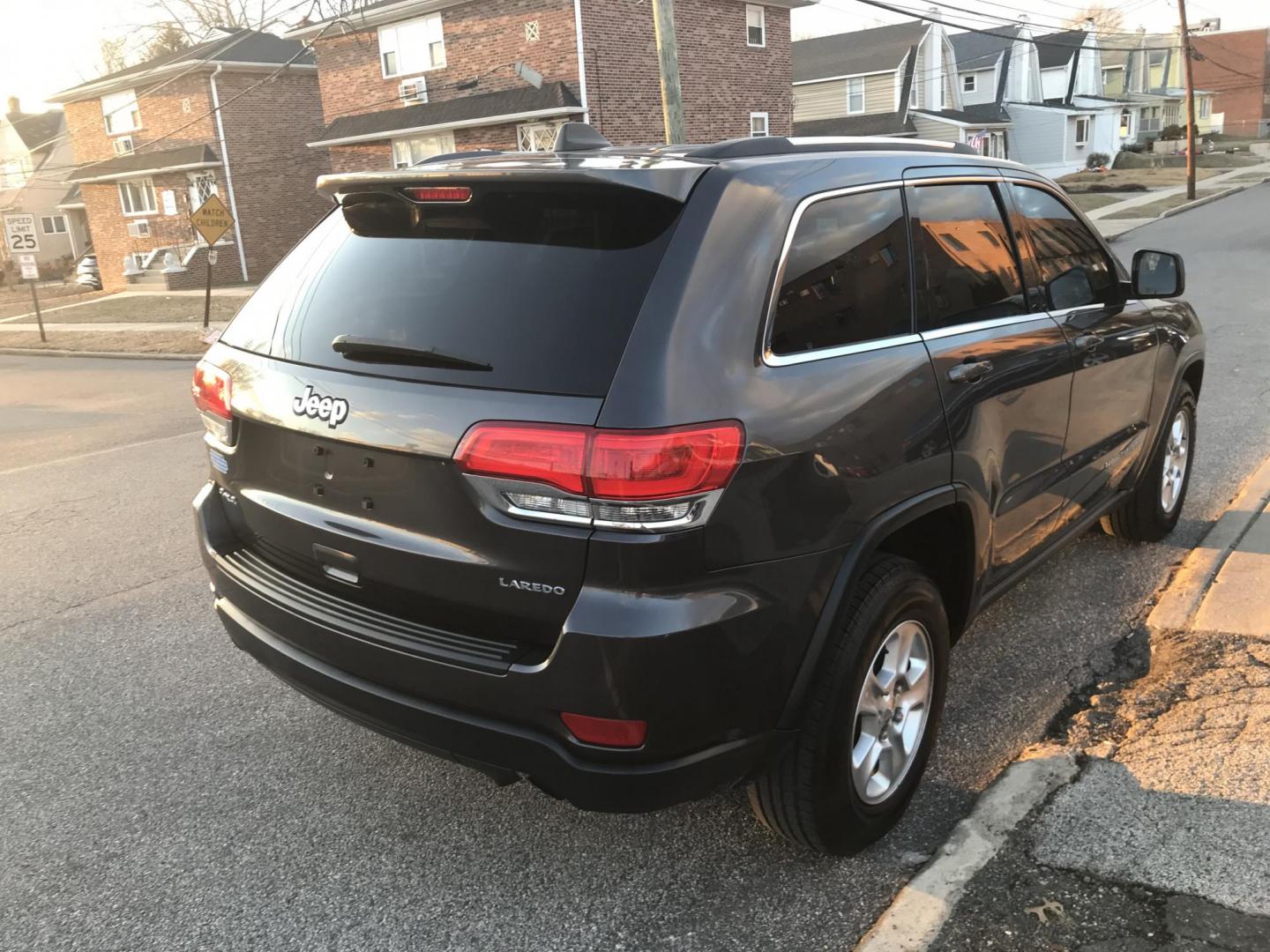 2014 Charcoal /Black Jeep Grand Cherokee Laredo 4WD (1C4RJFAG2EC) with an 3.6L V6 DOHC 24V engine, 5-Speed Automatic transmission, located at 577 Chester Pike, Prospect Park, PA, 19076, (610) 237-1015, 39.886154, -75.302338 - 2014 Jeep Grand Cherokee Laredo: 4x4, sunroof, new PA inspection, SUPER CLEAN, runs LIKE NEW! This vehicle comes inspected and has been given a bumper to bumper safety check. It is very clean, reliable, and well maintained. We offer a unique pay plan that is known for being the easiest and fastes - Photo#4