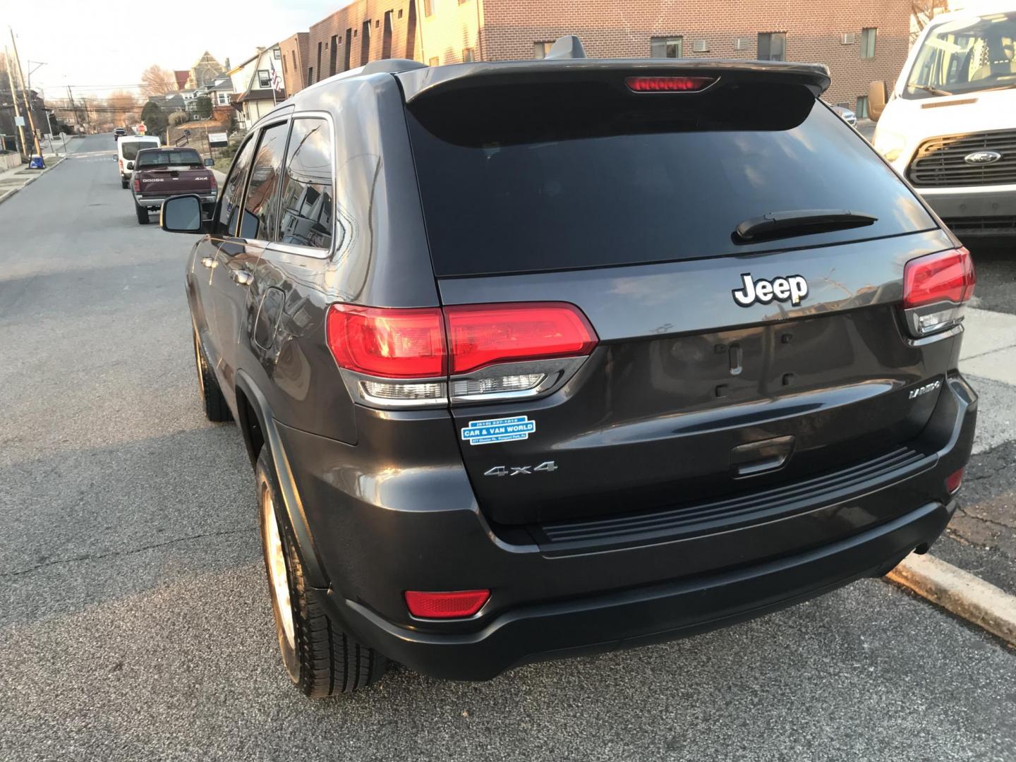 2014 Charcoal /Black Jeep Grand Cherokee Laredo 4WD (1C4RJFAG2EC) with an 3.6L V6 DOHC 24V engine, 5-Speed Automatic transmission, located at 577 Chester Pike, Prospect Park, PA, 19076, (610) 237-1015, 39.886154, -75.302338 - 2014 Jeep Grand Cherokee Laredo: 4x4, sunroof, new PA inspection, SUPER CLEAN, runs LIKE NEW! This vehicle comes inspected and has been given a bumper to bumper safety check. It is very clean, reliable, and well maintained. We offer a unique pay plan that is known for being the easiest and fastes - Photo#5