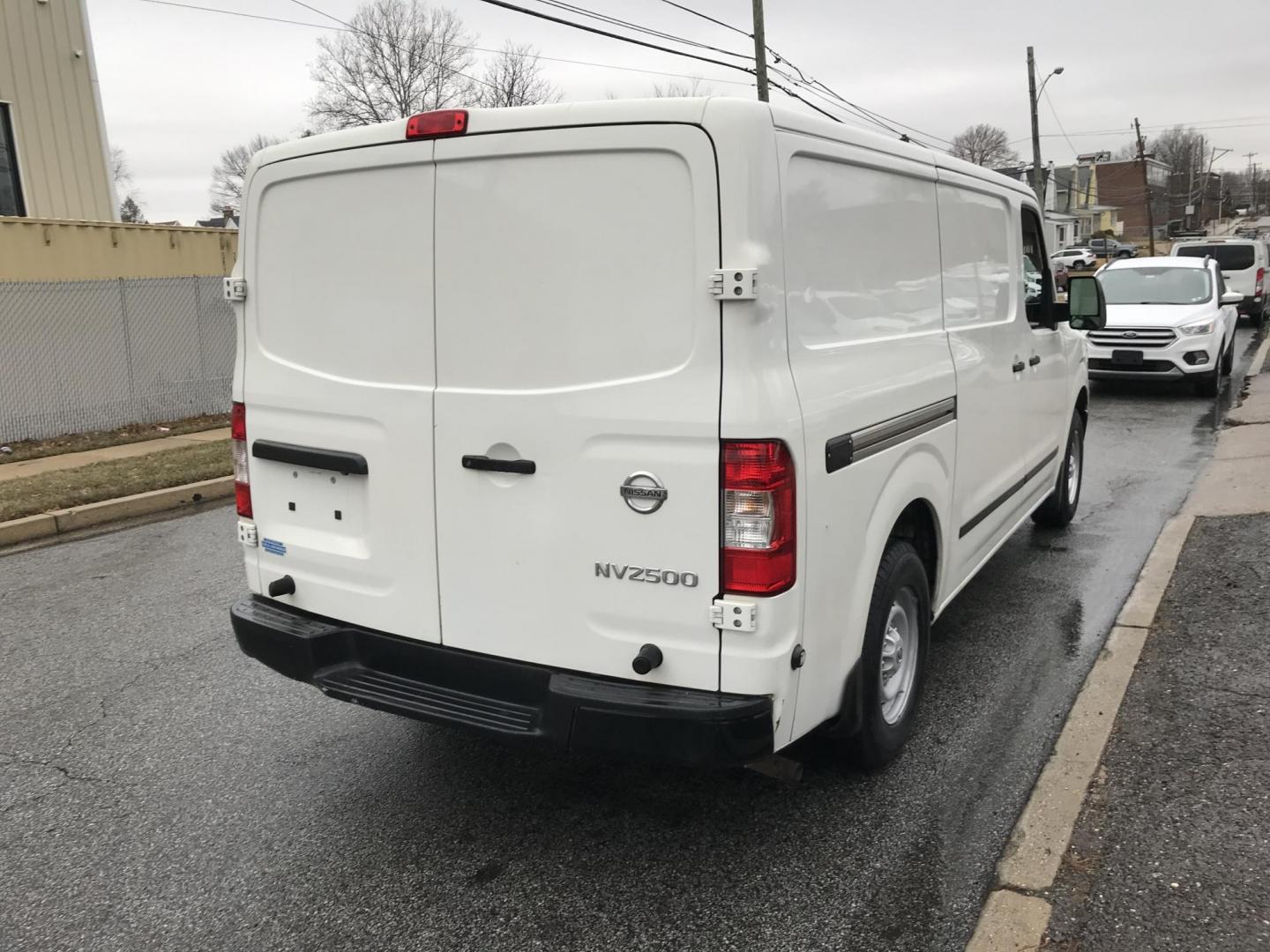 2019 White /Gray Nissan NV Cargo 2500 HD S V6 (1N6BF0KY9KN) with an 4.0L V6 engine, 5A transmission, located at 577 Chester Pike, Prospect Park, PA, 19076, (610) 237-1015, 39.886154, -75.302338 - 2019 Nissan NV 2500 Cargo Van: Backup camera, multiple pieces of shelving, no side or rear windows, aux port, new PA inspection, FLEET MAINTAINED, runs LIKE NEW! This vehicle comes inspected and has been given a bumper to bumper safety check. It is very clean, reliable, and well maintained. We of - Photo#4