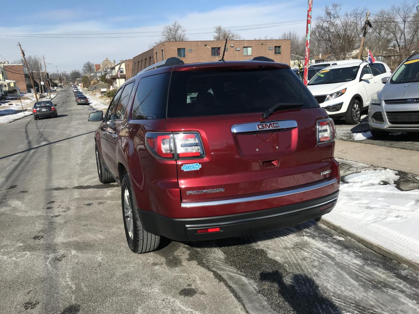 2015 Red /Gray GMC Acadia SLT-1 AWD (1GKKVRKD6FJ) with an 3.6L V6 DOHC 24V engine, 6-Speed Automatic transmission, located at 577 Chester Pike, Prospect Park, PA, 19076, (610) 237-1015, 39.886154, -75.302338 - 2015 GMC Acadia SLT: AWD, 2 sunroofs, backup camera, 3rd row seating, new PA inspection, runs LIKE NEW! This vehicle comes inspected and has been given a bumper to bumper safety check. It is very clean, reliable, and well maintained. We offer a unique pay plan that is known for being the easiest - Photo#4