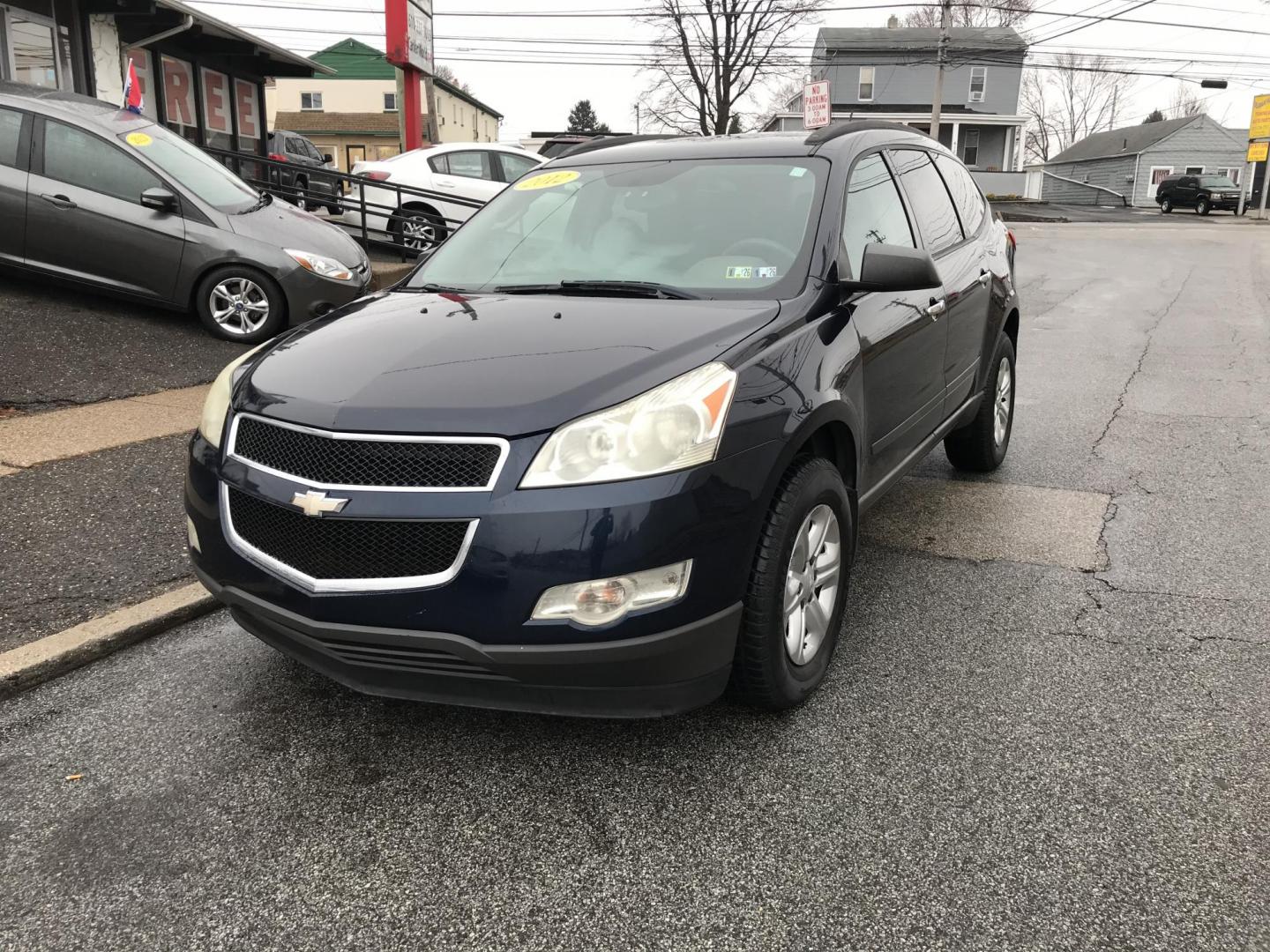 2012 Blue /Gray Chevrolet Traverse LS FWD w/PDC (1GNKRFED0CJ) with an 3.6L V6 DOHC 24V engine, 6-Speed Automatic transmission, located at 577 Chester Pike, Prospect Park, PA, 19076, (610) 237-1015, 39.886154, -75.302338 - 2012 Chevrolet Traverse: Only 94k miles, 3rd row seating, new PA inspection, SUPER CLEAN, runs LIKE NEW! This vehicle comes inspected and has been given a bumper to bumper safety check. It is very clean, reliable, and well maintained. We offer a unique pay plan that is known for being the easiest - Photo#3