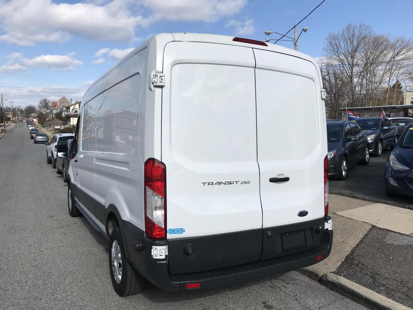 2016 White /Gray Ford Transit 250 Van Med. Roof w/Sliding Pass. 148-in. WB (1FTYR2CM9GK) with an 3.7L V6 DOHC 24V engine, 6-Speed Automatic transmission, located at 577 Chester Pike, Prospect Park, PA, 19076, (610) 237-1015, 39.886154, -75.302338 - 2019 Ford Transit 250 Medium Roof: Runs strong, has backup camera. Has check engine light on for catalytic converter. Needs inspection. Sold as-is. - Photo#2