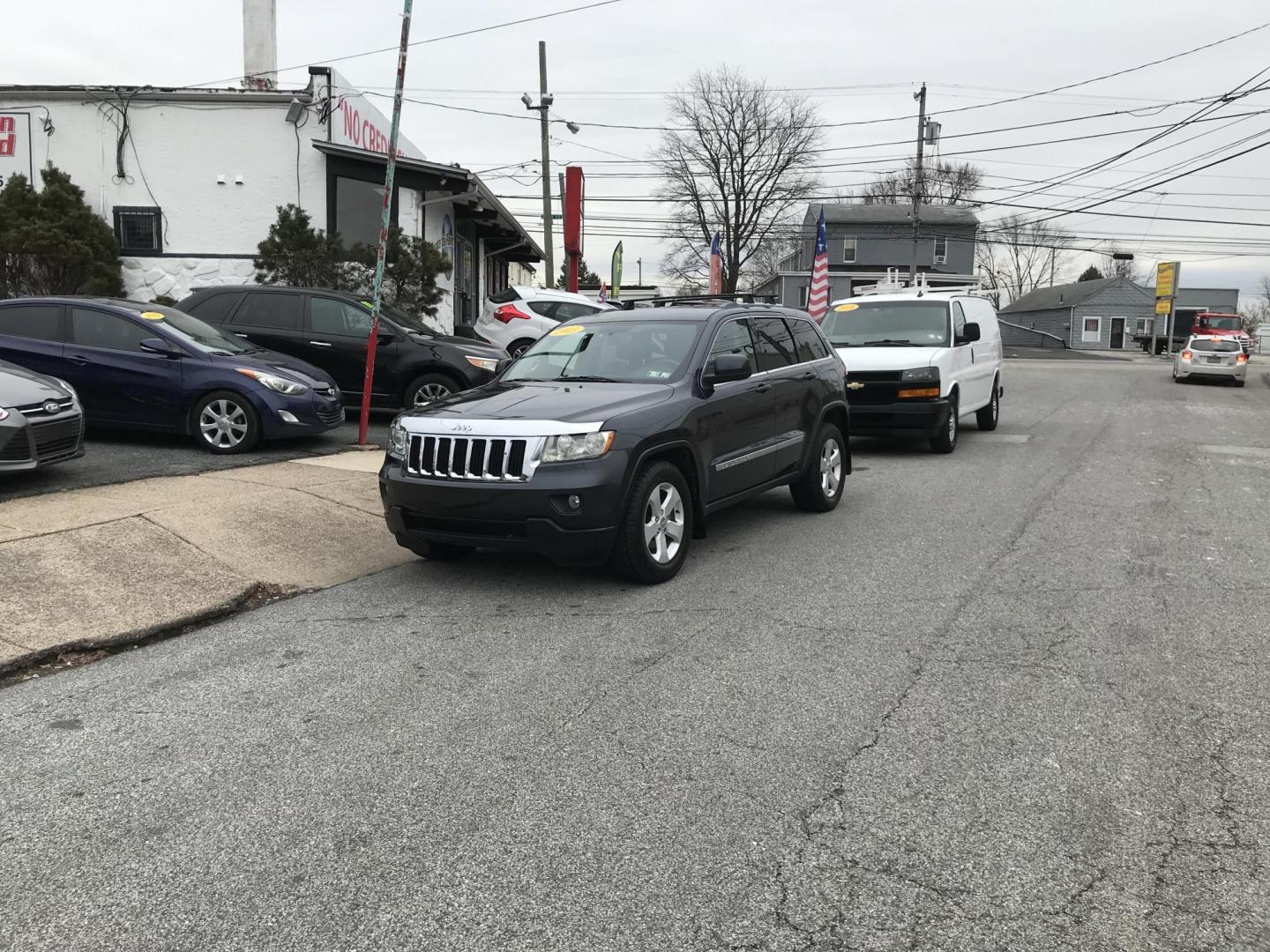 2013 Black /Black Jeep Grand Cherokee Laredo 4WD (1C4RJFAT5DC) with an 5.7L V8 OHV 16V engine, 5-Speed Automatic transmission, located at 577 Chester Pike, Prospect Park, PA, 19076, (610) 237-1015, 39.886154, -75.302338 - 2013 Jeep Grand Cherokee Laredo: Backup camera, trailer hitch, leather seats, new PA inspection, runs LIKE NEW! This vehicle comes inspected and has been given a bumper to bumper safety check. It is very clean, reliable, and well maintained. We offer a unique pay plan that is known for being the - Photo#2