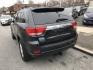 2013 Black /Black Jeep Grand Cherokee Laredo 4WD (1C4RJFAT5DC) with an 5.7L V8 OHV 16V engine, 5-Speed Automatic transmission, located at 577 Chester Pike, Prospect Park, PA, 19076, (610) 237-1015, 39.886154, -75.302338 - 2013 Jeep Grand Cherokee Laredo: Backup camera, trailer hitch, leather seats, new PA inspection, runs LIKE NEW! This vehicle comes inspected and has been given a bumper to bumper safety check. It is very clean, reliable, and well maintained. We offer a unique pay plan that is known for being the - Photo#7