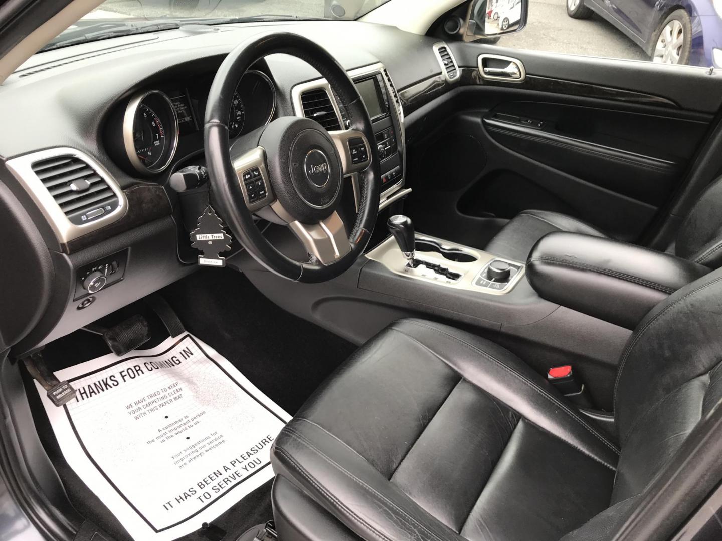 2013 Black /Black Jeep Grand Cherokee Laredo 4WD (1C4RJFAT5DC) with an 5.7L V8 OHV 16V engine, 5-Speed Automatic transmission, located at 577 Chester Pike, Prospect Park, PA, 19076, (610) 237-1015, 39.886154, -75.302338 - 2013 Jeep Grand Cherokee Laredo: Backup camera, trailer hitch, leather seats, new PA inspection, runs LIKE NEW! This vehicle comes inspected and has been given a bumper to bumper safety check. It is very clean, reliable, and well maintained. We offer a unique pay plan that is known for being the - Photo#8