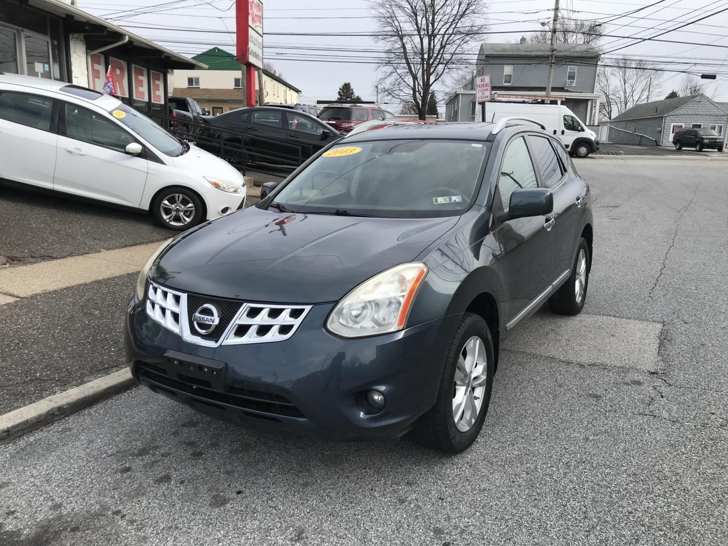 2013 Blue /Black Nissan Rogue S AWD (JN8AS5MV6DW) with an 2.5L L4 DOHC 16V engine, Continuously Variable Transmission transmission, located at 577 Chester Pike, Prospect Park, PA, 19076, (610) 237-1015, 39.886154, -75.302338 - Photo#2