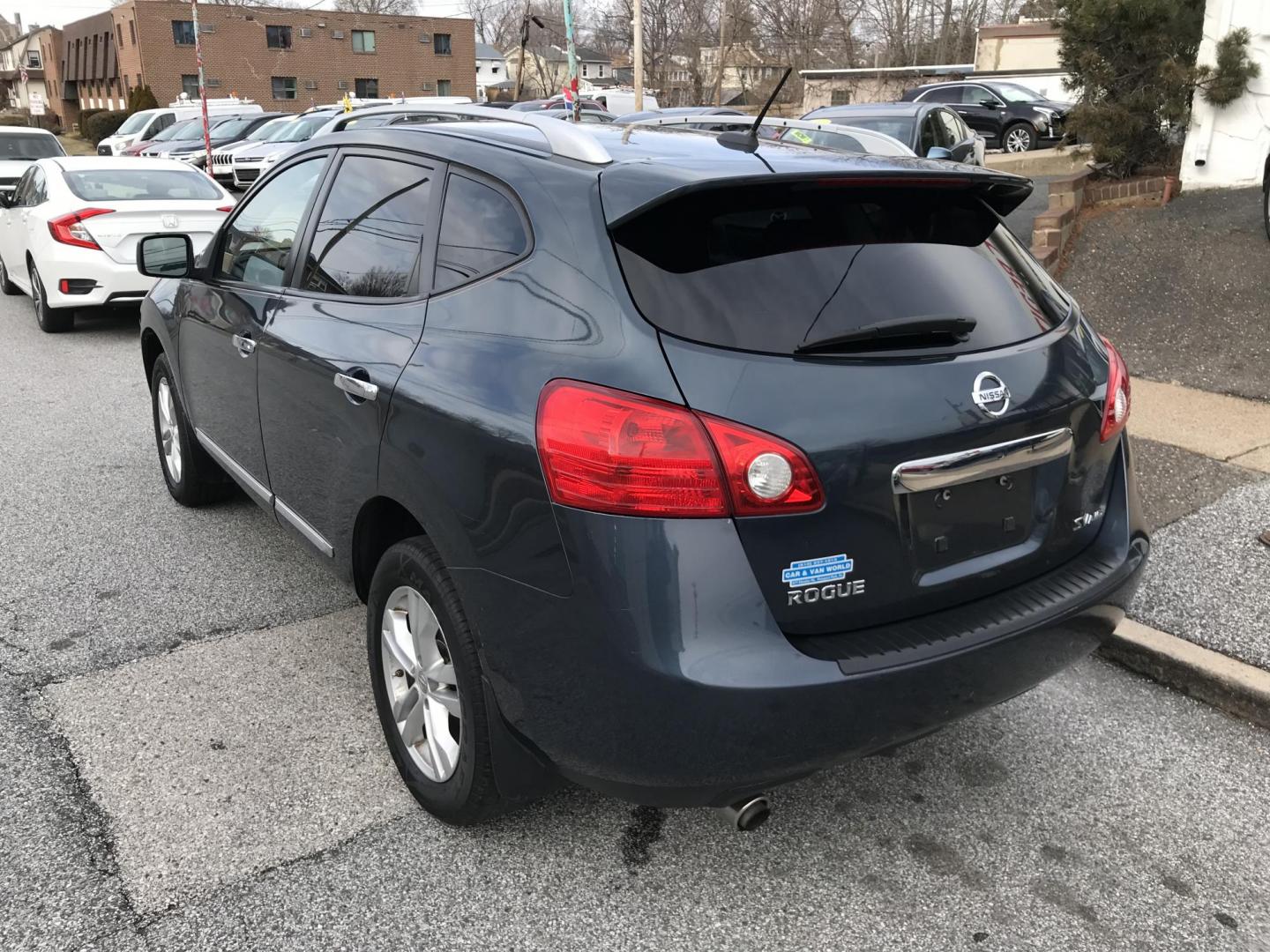 2013 Blue /Black Nissan Rogue S AWD (JN8AS5MV6DW) with an 2.5L L4 DOHC 16V engine, Continuously Variable Transmission transmission, located at 577 Chester Pike, Prospect Park, PA, 19076, (610) 237-1015, 39.886154, -75.302338 - Photo#4