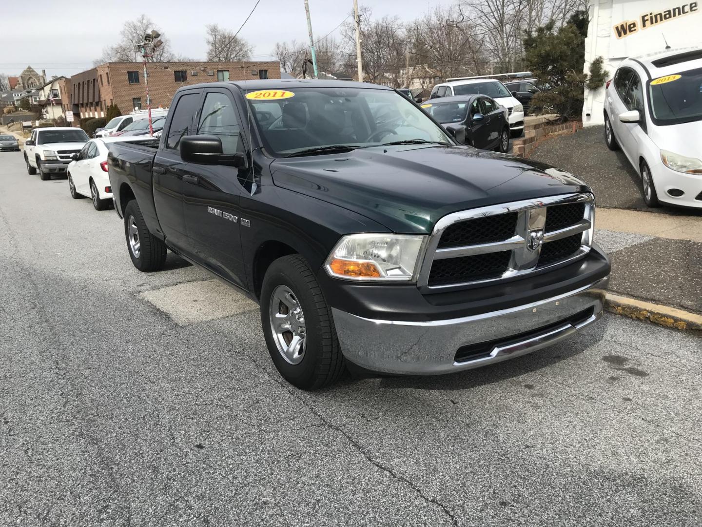 2011 Green /Gray Dodge Ram 1500 SLT Quad Cab (1D7RB1GT1BS) with an 5.7L V8 OHV 16V engine, 5-Speed Automatic transmission, located at 577 Chester Pike, Prospect Park, PA, 19076, (610) 237-1015, 39.886154, -75.302338 - 2011 Dodge Ram 1500: Only 129k miles, 5.7 Liter HEMI engine, trailer hitch, new PA inspection, runs LIKE NEW! This vehicle comes inspected and has been given a bumper to bumper safety check. It is very clean, reliable, and well maintained. We offer a unique pay plan that is known for being the ea - Photo#1