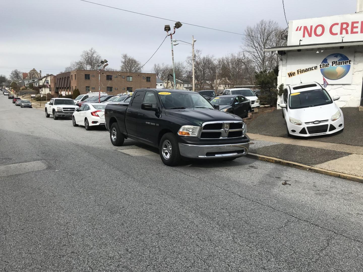 2011 Green /Gray Dodge Ram 1500 SLT Quad Cab (1D7RB1GT1BS) with an 5.7L V8 OHV 16V engine, 5-Speed Automatic transmission, located at 577 Chester Pike, Prospect Park, PA, 19076, (610) 237-1015, 39.886154, -75.302338 - 2011 Dodge Ram 1500: Only 129k miles, 5.7 Liter HEMI engine, trailer hitch, new PA inspection, runs LIKE NEW! This vehicle comes inspected and has been given a bumper to bumper safety check. It is very clean, reliable, and well maintained. We offer a unique pay plan that is known for being the ea - Photo#2