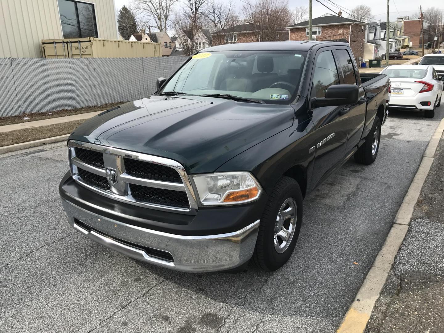 2011 Green /Gray Dodge Ram 1500 SLT Quad Cab (1D7RB1GT1BS) with an 5.7L V8 OHV 16V engine, 5-Speed Automatic transmission, located at 577 Chester Pike, Prospect Park, PA, 19076, (610) 237-1015, 39.886154, -75.302338 - 2011 Dodge Ram 1500: Only 129k miles, 5.7 Liter HEMI engine, trailer hitch, new PA inspection, runs LIKE NEW! This vehicle comes inspected and has been given a bumper to bumper safety check. It is very clean, reliable, and well maintained. We offer a unique pay plan that is known for being the ea - Photo#3