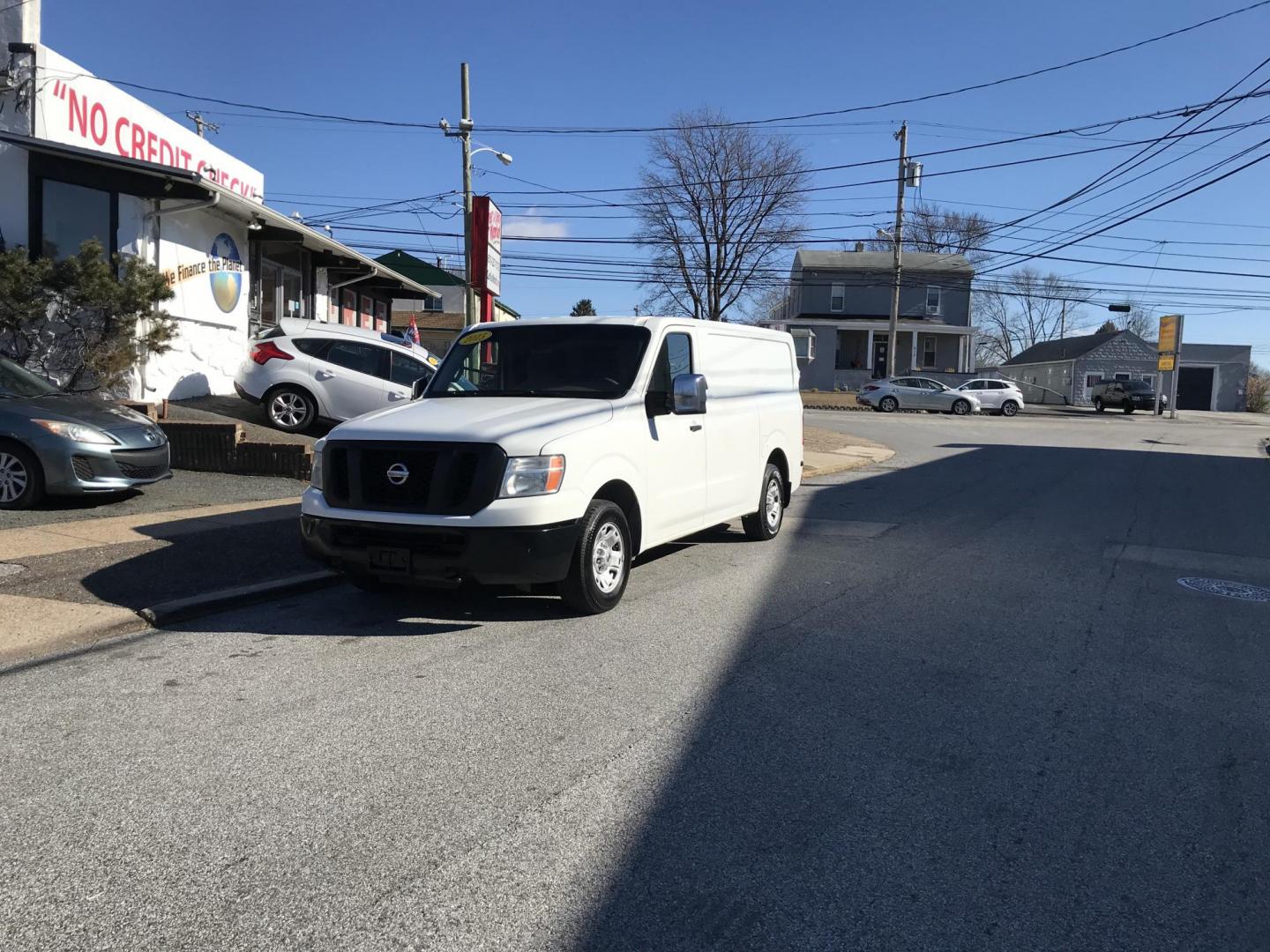 2015 White /Gray Nissan NV Cargo 2500 HD S (1N6AF0KY4FN) with an 5.6L V8 DOHC 32V engine, 5-Speed Automatic transmission, located at 577 Chester Pike, Prospect Park, PA, 19076, (610) 237-1015, 39.886154, -75.302338 - 2015 Nissan NV 2500 HD Cargo Van: Multiple pieces of shelving, no side windows, runs STRONG. Has check engine light for a catalytic and converter. Needs inspection. Sold as-is. - Photo#2