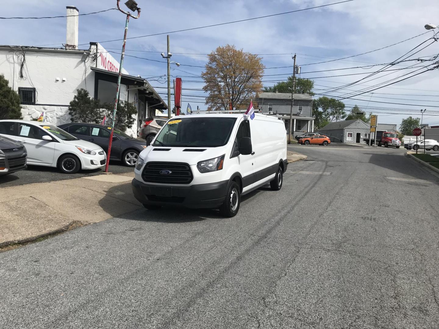 2017 White /Gray Ford Transit 150 Van Low Roof 60/40 Pass. 148-in. WB (1FTYE9ZG2HK) with an 3.5L V6 DOHC 24V engine, 6A transmission, located at 577 Chester Pike, Prospect Park, PA, 19076, (610) 237-1015, 39.886154, -75.302338 - 2017 Ford Transit 150 Extended Body: Ladder racks, shelving, backup camera, partition, FLEET MAINTAINED, runs LIKE NEW! This vehicle comes inspected and has been given a bumper to bumper safety check. It is very clean, reliable, and well maintained. We offer a unique pay plan that is known for be - Photo#1